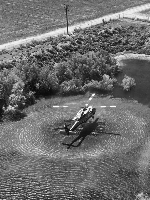 Aerial view — Firehawk water ops, black and white
