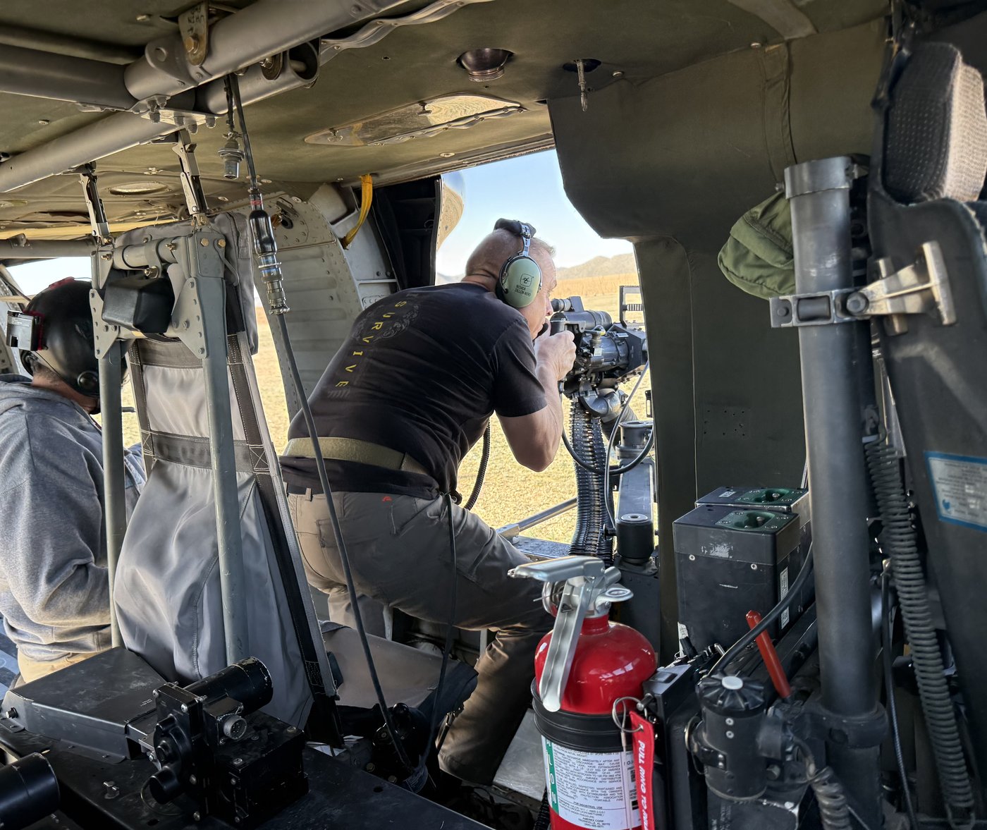 Operator firing from Black Hawk doorway