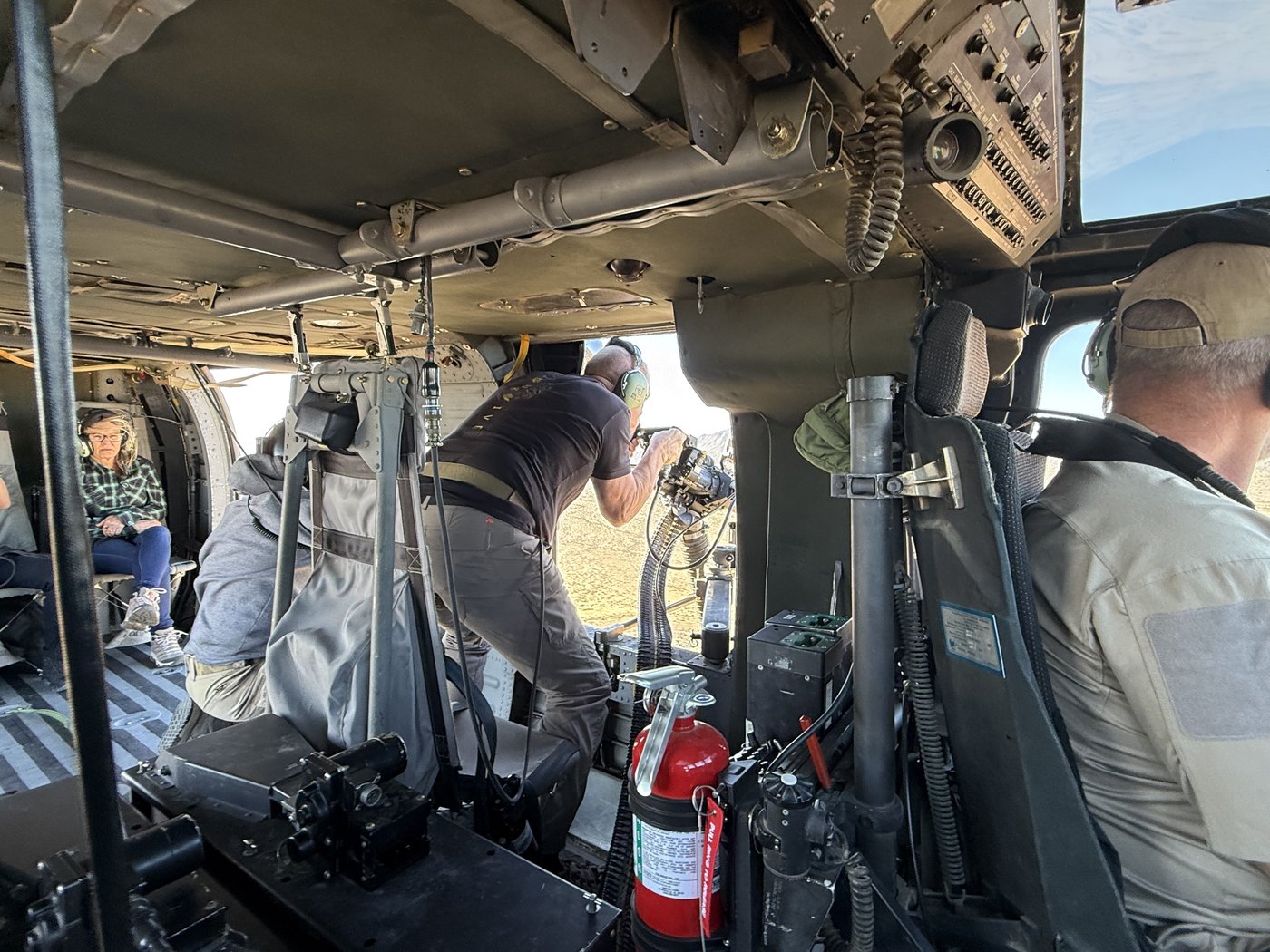 Multiple crew inside Black Hawk cargo area